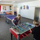 Salle de jeux, babyfoot et une table de ping pong
